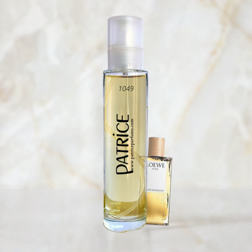 1049 - equivalente a Aura white Magnolia de Loewe.
